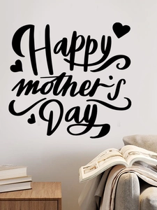 Detail of Happy Mother's Day wall decal with black artistic font in a living room setup
