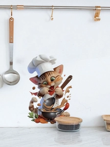 Detailed view of chef cat wall sticker on a white kitchen backsplash with dynamic cooking art