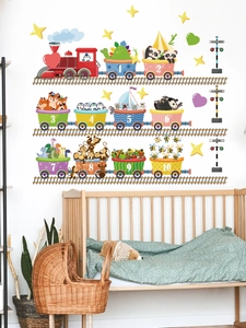 Detail of cartoon animal number train wall sticker in a nursery room setting