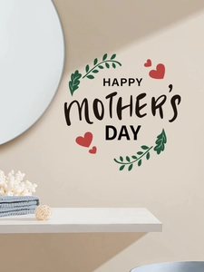 Detail showing Happy Mother's Day wall stickers with green leaves and red hearts on beige wall