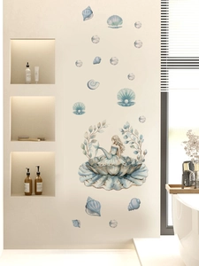 Detailed watercolor blue mermaid and sea shell wall stickers applied in a modern bathroom