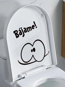 Close-up of Bájame funny cartoon face toilet lid sticker in black and white PVC