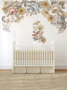 Detail of vintage floral wall stickers with hand-drawn yellow roses in a cozy bedroom