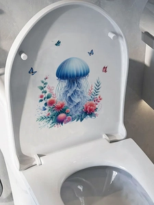 Detail of blue jellyfish and pink flowers self-adhesive PVC sticker on a white toilet lid