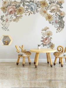 Detailed close-up of vintage yellow floral wall stickers in a cozy minimalist room setting