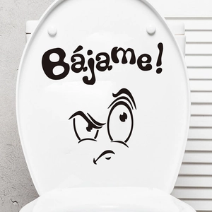 Funny cartoon angry face toilet sticker with Spanish text Bajame on white lid