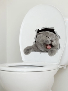 Realistischer 3D-Aufkleber mit einer grauen Katze, die aus einem Mauerbruch herausschaut