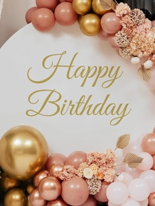 Close-up of golden Happy Birthday wall sticker set with balloons and floral decor