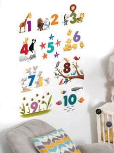 Detail of 1-10 animal number wall stickers in a cozy nursery room setting