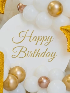 Detail of Happy Birthday backdrop with white, gold and rose gold party balloons set
