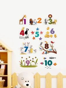 Detail view of colorful animal number wall stickers 1-10 in a cozy nursery room setting