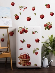 Realistic red apple and cherry wall stickers applied on a white refrigerator surface