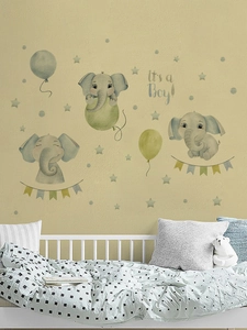 Detail of baby elephant wall stickers with balloons and It's a Boy text for nursery decor