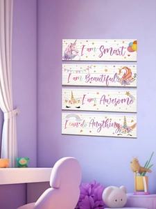 Detailed view of four unicorn wooden wall plaques with rainbow motifs and inspirational quotes
