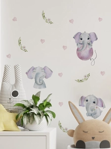 Detail of cute watercolor elephant wall decals with hearts for nursery wall decor