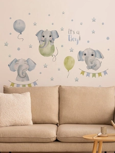 Detail of blue elephant wall decals with 'It's a Boy' text for nursery room wall decor