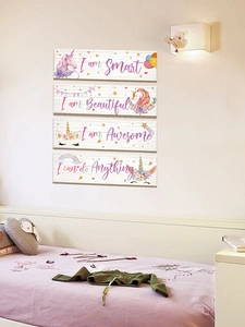 Vertical wall display of four unicorn themed wooden plaques with motivational quotes
