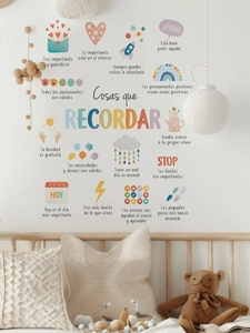 Detail of colorful Spanish motivational wall stickers with hand-drawn illustrations