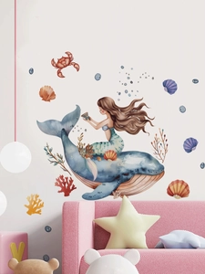 Watercolour mermaid and whale wall sticker set in a cozy children room setting