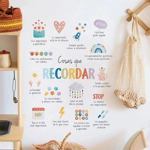 Spanish educational wall decals for kids room with colorful icons like rockets and rainbows
