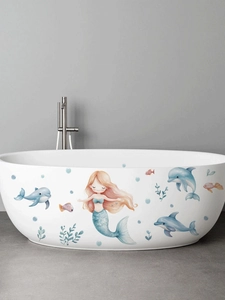 Détail de stickers autocollants sirène et dauphin à l'aquarelle sur une baignoire blanche