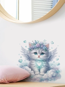 Detail of hand-drawn white angel cat wall sticker featuring blue floral crown and wings