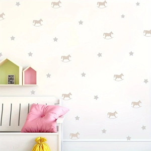 Nursery wall decals featuring beige rocking horses and grey stars for kids room decor
