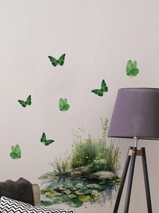 Detail showing green butterfly wall stickers with pond grass on a white living room wall