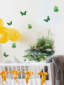 Detail showing green butterfly wall decals with lotus and pond grass on white walls