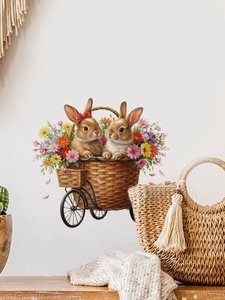 Dettaglio di adesivi murali con coniglietto pasquale e cesto di fiori su bici vintage