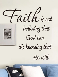 Detail view of Faith religious quote wall sticker above a blue sofa in a home setting