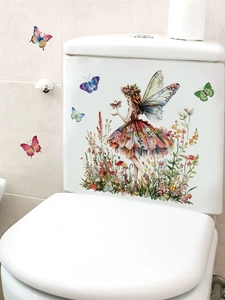 Detail of floral butterfly girl wall sticker on white toilet for home bathroom decor