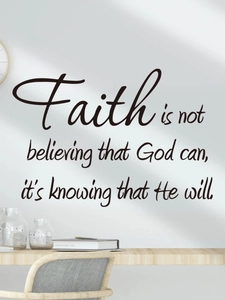 Close-up of Faith quote wall decal in a minimalist study room with wooden desk