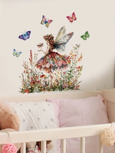 Detail of forest fairy and colorful butterflies watercolor wall stickers in a nursery decor