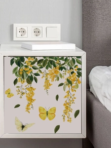 Detail of yellow flower vine and butterflies self-adhesive wall sticker on cabinet