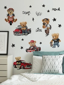 Detail showing dynamic cartoon bear wall stickers with stars on a cozy bedroom wall