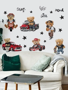 Cool cartoon bears on wall with stars above a cozy sofa in a modern kids room