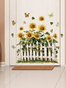 Detail showing self-adhesive sunflower wall stickers with white fence and butterflies
