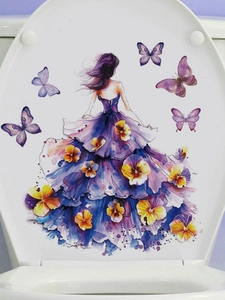 Detail of purple watercolor butterfly girl sticker on a white toilet lid surface
