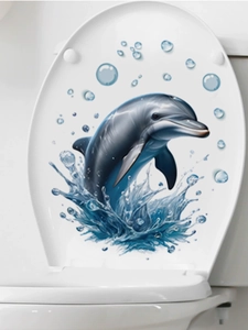 Detailed view of 3D dolphin wall sticker with water splashes applied to a white toilet lid