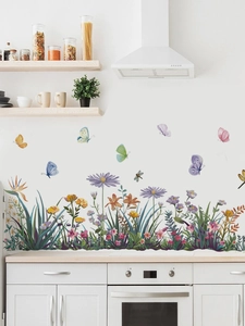 Floral garden wall stickers with colorful butterflies and flowers on a kitchen wall background