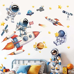 Space themed wall stickers with astronauts and rockets for kids bedroom decoration