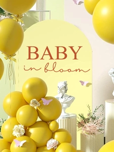 Detailed close-up of Baby in Bloom arch backdrop with balloons and floral decor