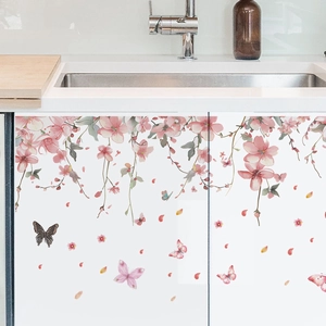Pink floral vine wall stickers with butterflies on white kitchen cabinets decor