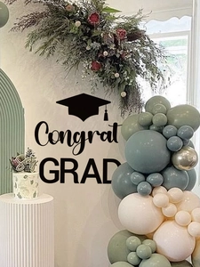 Detail of graduation party kit with Morandi balloons and Congrat GRAD wall stickers