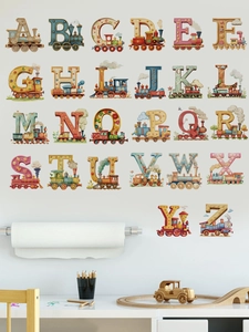 Detailed view of colorful cartoon alphabet train wall stickers in a nursery setting
