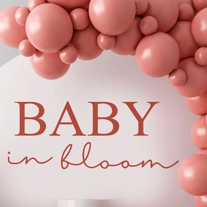 Baby in Bloom shower party decor with retro pink and dusty rose latex balloon arch