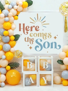 Detailed set of Here Comes The Son party decor with balloons and baby blocks