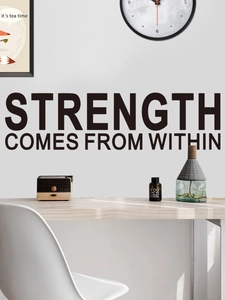 Detail view of Strength Comes From Within motivational wall decal in minimalist workspace