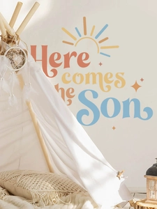 Retro Here Comes The Son wall decals featuring sun and stars in a cozy nursery setting